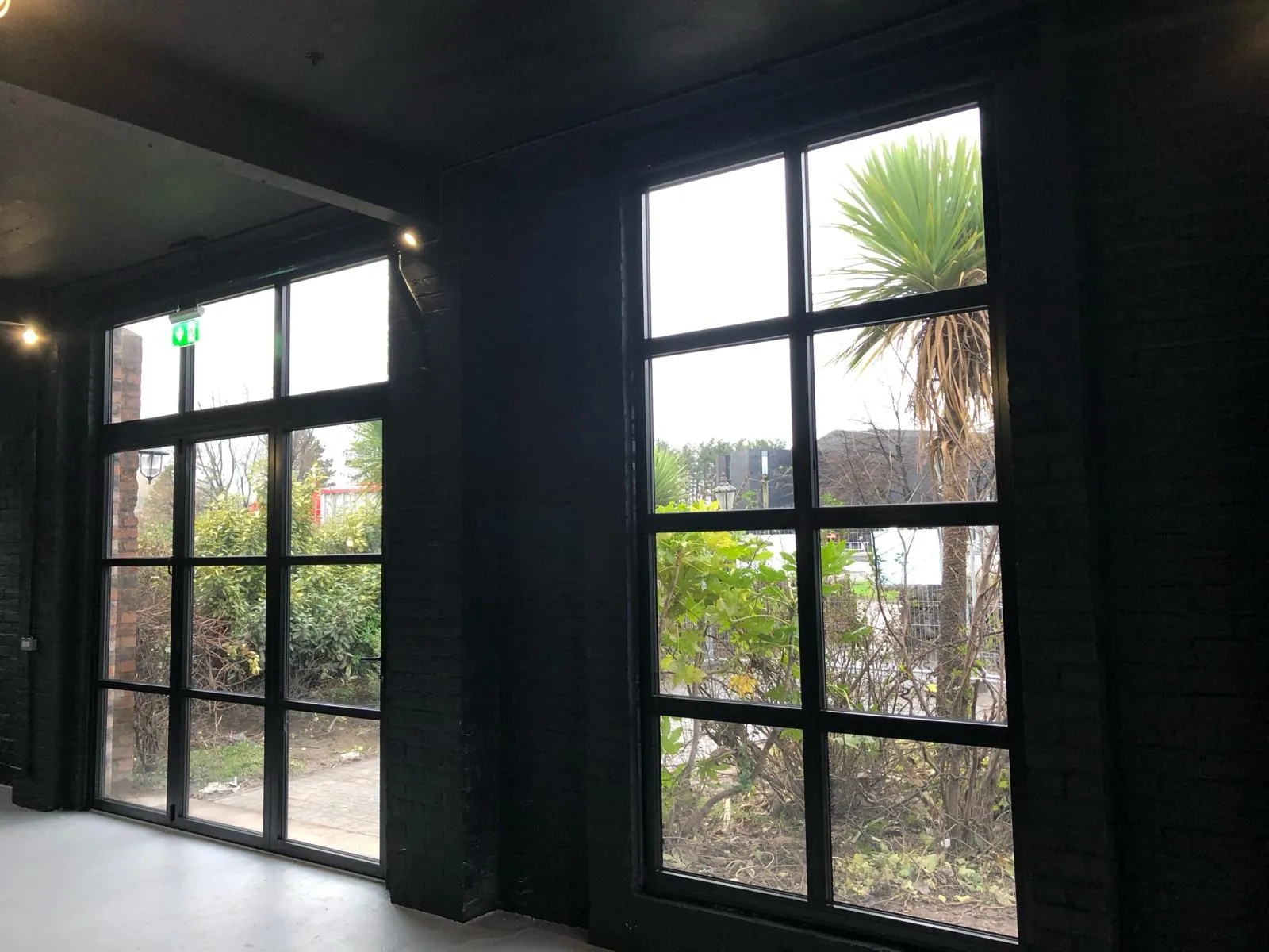 Internal view from closed bifold door and aluminium window at grant's distillery 